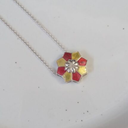 92.5 sterling silver rangoli pendant with red and yellow enamel